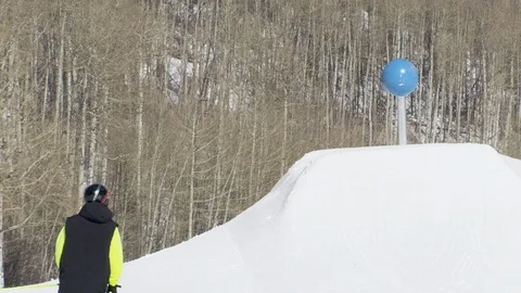 Freestyle skier jumping over obstacle in the terrain park Stock Footage 113199962