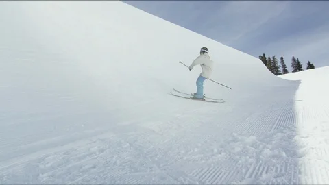 Freestyle skier landing a 720 off of a halfpipe Stock Footage 113199023