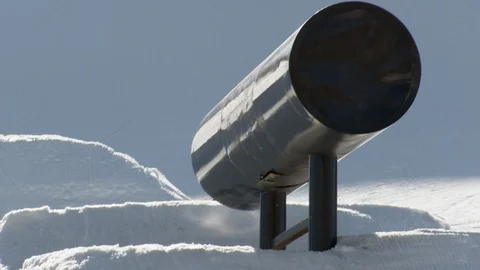 Freestyle snowboarder grinding and falling off rail in terrain park Stock Footage 113201130