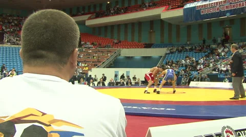 Freestyle wrestler rolls another wrestler 06 Stock Footage 44218690