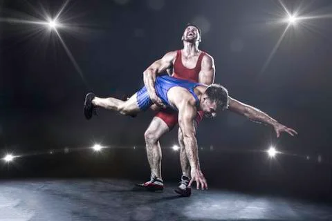 Freestyle wrestler throwing Stock Photos