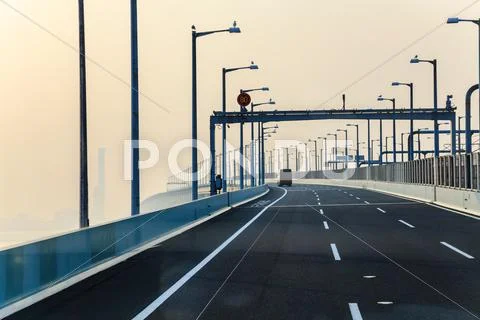 Freeway and the morning mist Stock Photos