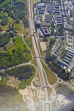 Freeway and roundabout pattern with traffic aerial Stock Photos