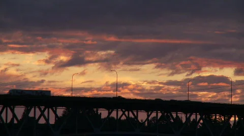 Freeway bridge sunset Stock Footage