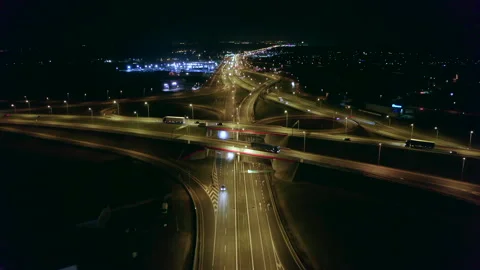 Freeway with bridges and interchanges at night suburbs of Warsaw aerial view. Stock Footage 200849415
