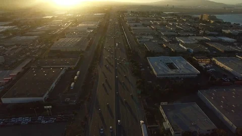 Freeway &amp; Buildings at Sunset Aerial Drone Stock Footage 72228532