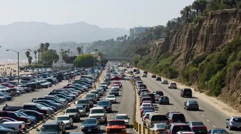  freeway with cars commuting, commuters driving traffic Santa Monica ocean LA Stock Footage