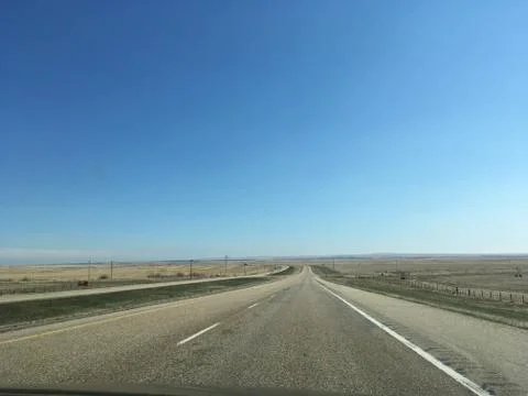 Freeway with clear blue sky  Stock Photos