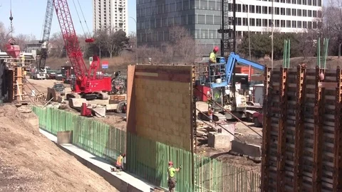 Freeway Construction workers build cement forms Stock Footage 105607032