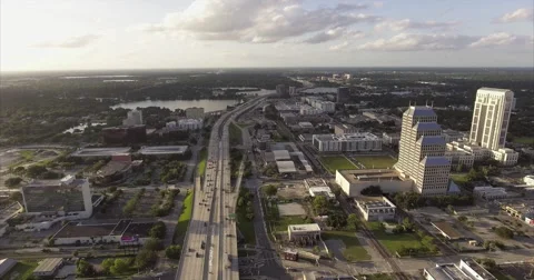 Freeway corridor and a lone tower on the Orlando fringe Stock-Footage 64819518