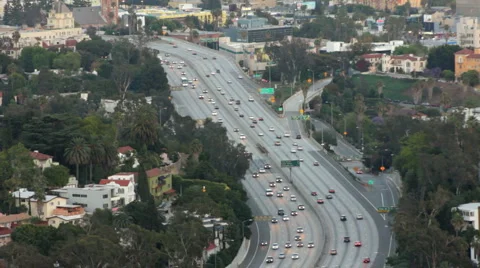 FREEWAY CURVE AT SUNSET Stock Footage 5297863
