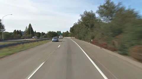 Freeway Driving 101 North - 2 VW Buses pass Stock Footage 10757406