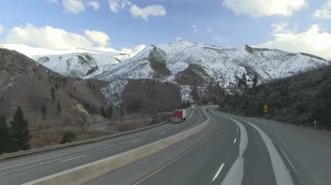 Freeway driving, Mountain highway, snow covered, elevated pov Video stock 21932401