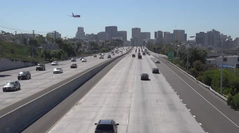 Freeway flyover by jet Stock Footage 49760405