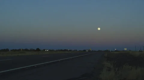 On the Freeway with Full Moon Stock Footage 55557191