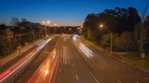 Freeway (highway) traffic Day to Night Timelapse Stock Footage 113865357