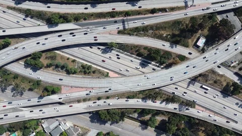 Freeway Interchange Aerial View Turning Counter Clockwise Stock Footage 276930023