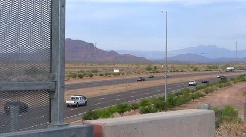 Freeway with mountains Stock Footage 11299384