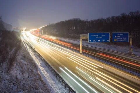 Freeway at night driving fast Stock Photos