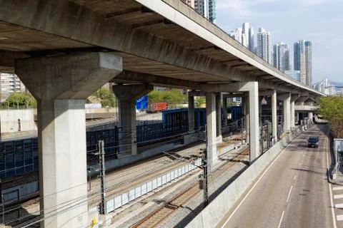 Freeway overpasses and train tracks Stock Photos