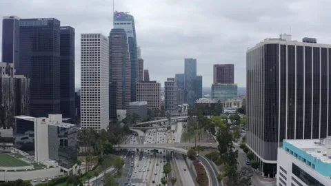 Freeway Through Downtown DTLA Cityscape Los Angeles California Drone View Stock Footage