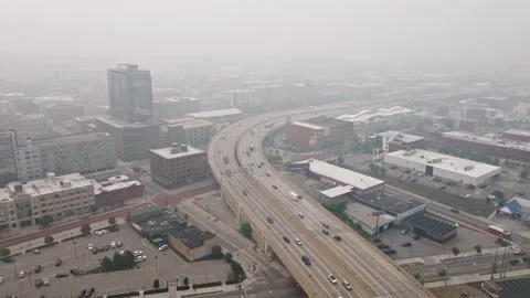 Freeway Traffic Curving Through Grand Rapids in Wildfire Smoke Stock Footage 340403004