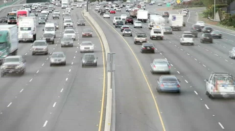 Freeway traffic in fast motion  3 Stock Footage 563340