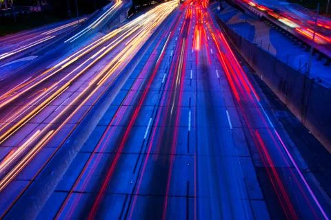 Freeway traffic at night Stock Photos