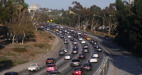 Freeway traffic with Trees in Los Angeles California. Highway 101 Stock Footage 72330509