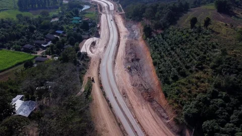 Freeway under construction in mountainous area. Stock Footage 296308868
