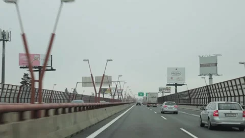 Freeway within the city limits. The flow of cars. Car traffic jams. Stock Footage 220227027