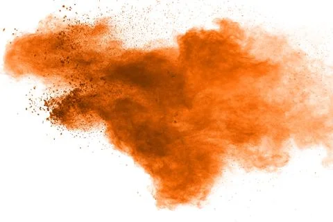 Freeze motion of brown powder exploding. Abstract design of color powder cloud. 库存照片