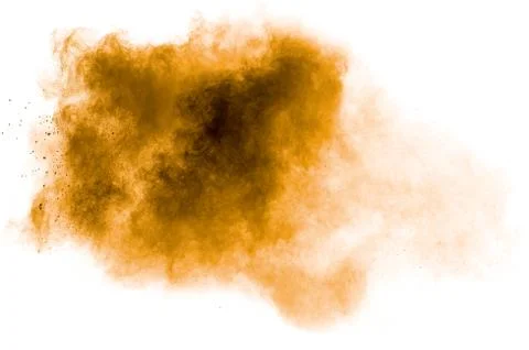 Freeze motion of brown powder exploding. Abstract design of brown dust cloud 库存照片