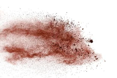 Freeze motion of brown powder exploding. Abstract design of brown dust cloud. 库存照片