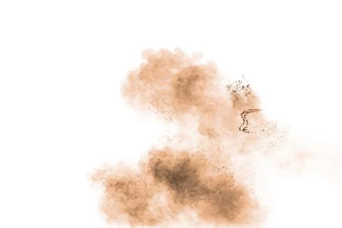 Freeze motion of brown powder exploding. Abstract design of brown dust cloud 库存照片