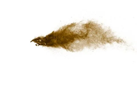 Freeze motion of brown powder exploding. Abstract design of brown dust. 库存照片