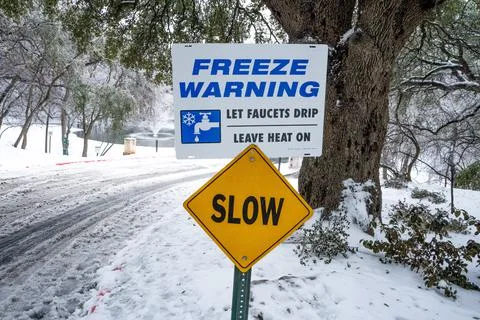 Freeze Warning Sign - Austin Texas Winter Storm Stock Photos