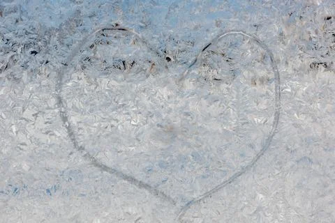 Freezed heart on the window Foto stock