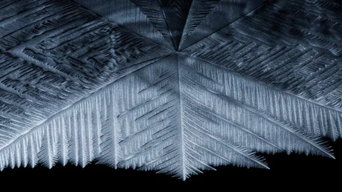 Freezing pattern spreading on a black background Stock Footage 276390605