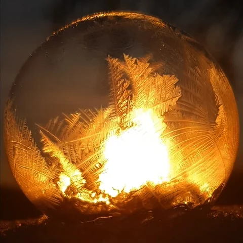 Freezing soap bubble against the background of the sun 4k Stock Footage 255955855