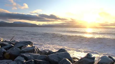 Freezing Spray on Rocks During Sunset 1 스톡 동영상 8997684