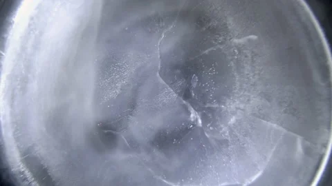 Freezing water, cracking ice Stock Footage 193140126
