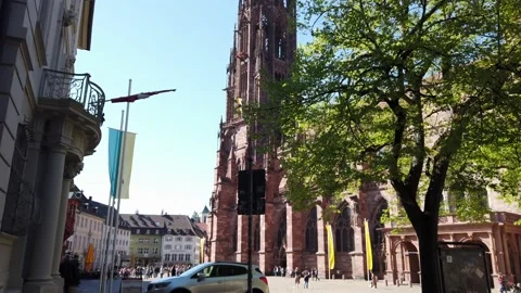 Freiburg Minster cathedral with bell ringing Stock Footage 234888426