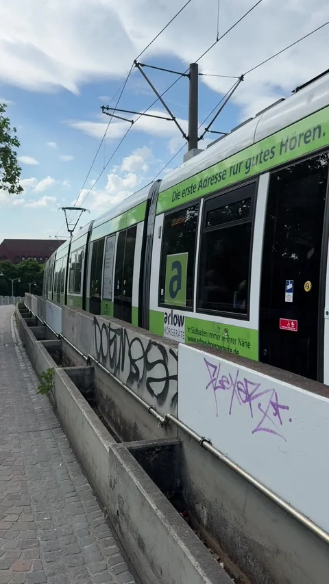 Freiburg tram moving through city streets in Germany Stock Footage 337433756