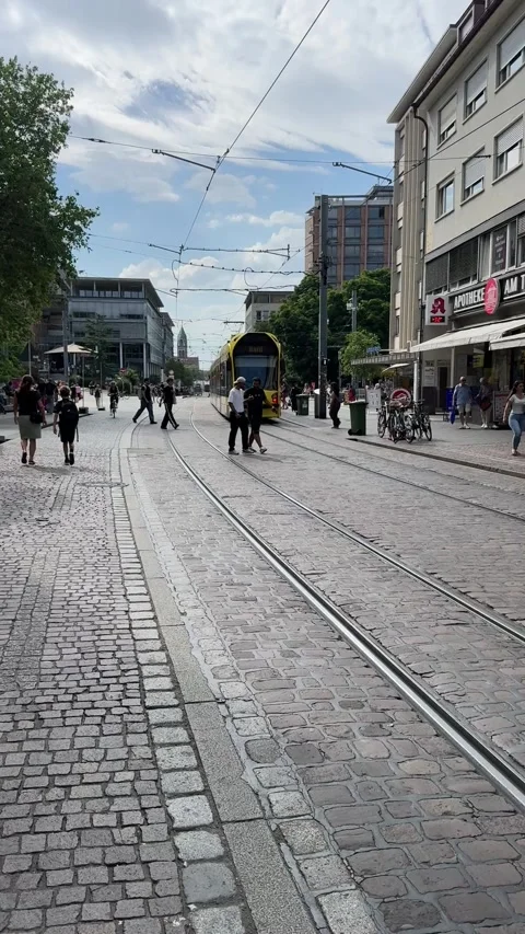 Freiburg tram moving through city streets in Germany Stock Footage 337433760