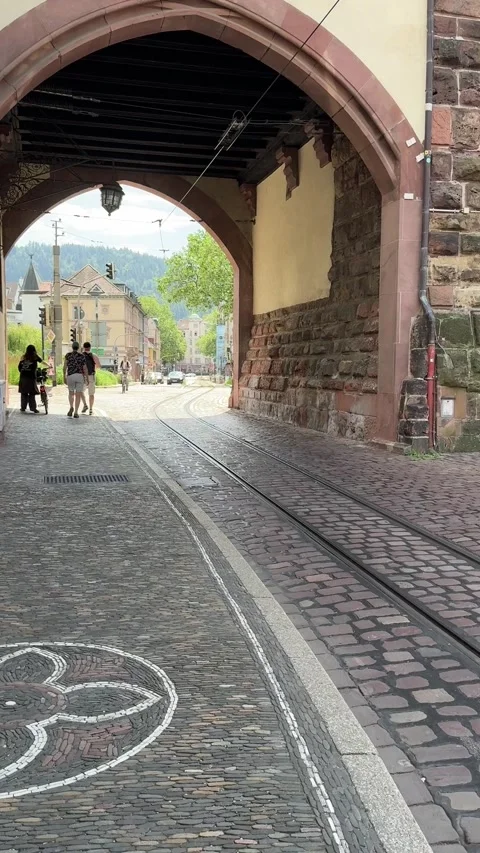 Freiburg tram moving through city streets in Germany Stock Footage 337433771