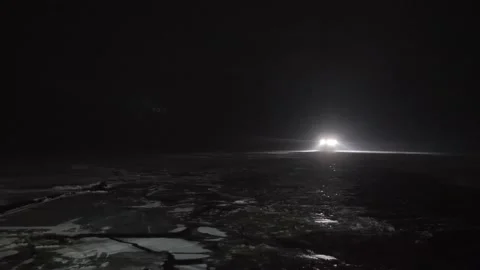 Freight cargo ship sail in the night in arctic water Vidéo 142419396