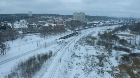 Freight Cargo Train Going through winter forest in the suburbs , a bird's-eye Video stock 126362439