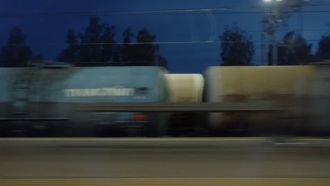 Freight cargo train moves past platform Stock Footage 115542211