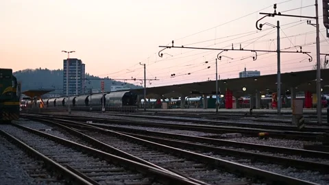 Freight cargo train slowly leaving Stock Footage 171991159